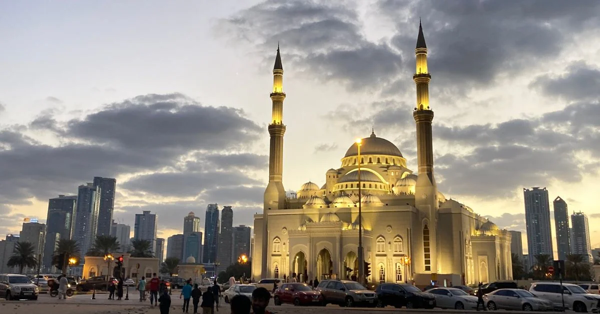 People heading to a large mosque for prayers