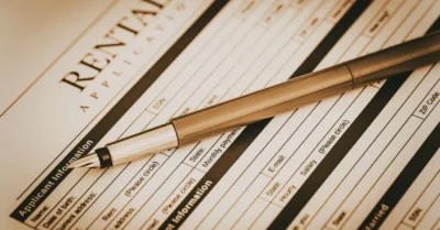 Pen placed on a rental application papers