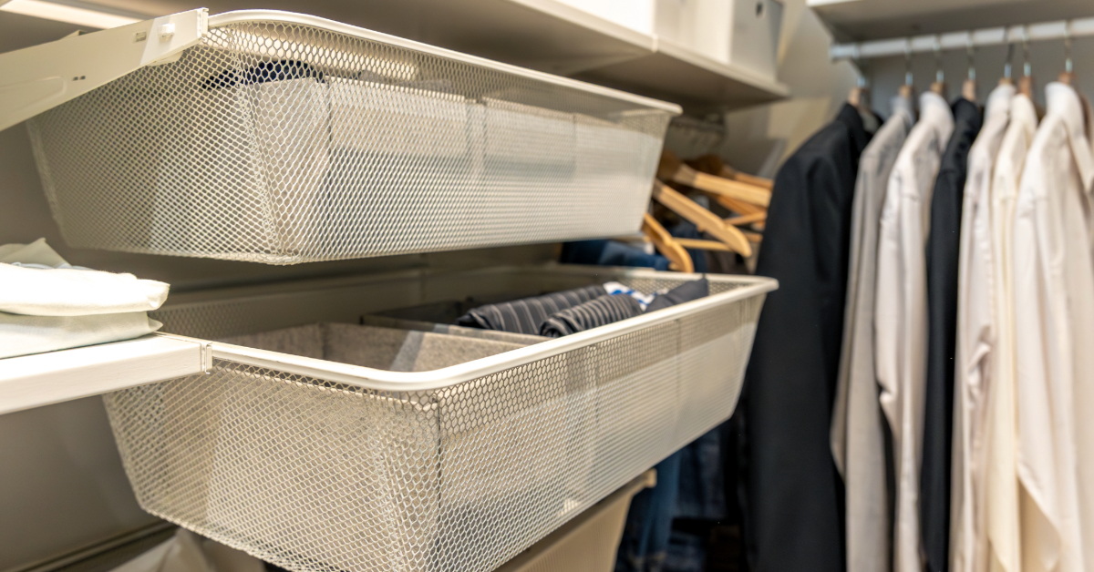 Clothes stacked in storage bins to save space