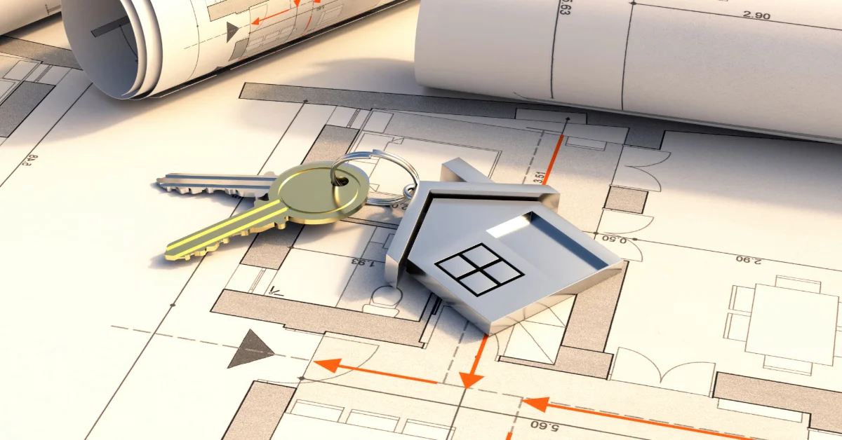 House keys and construction blueprint plans for an off-plan property in UAE