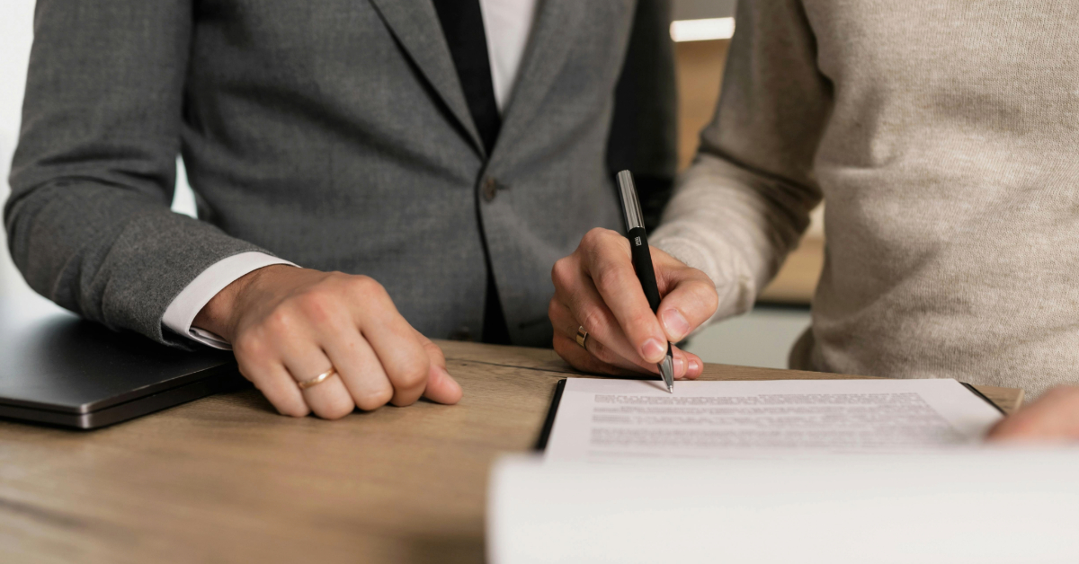 Person signing a contract
