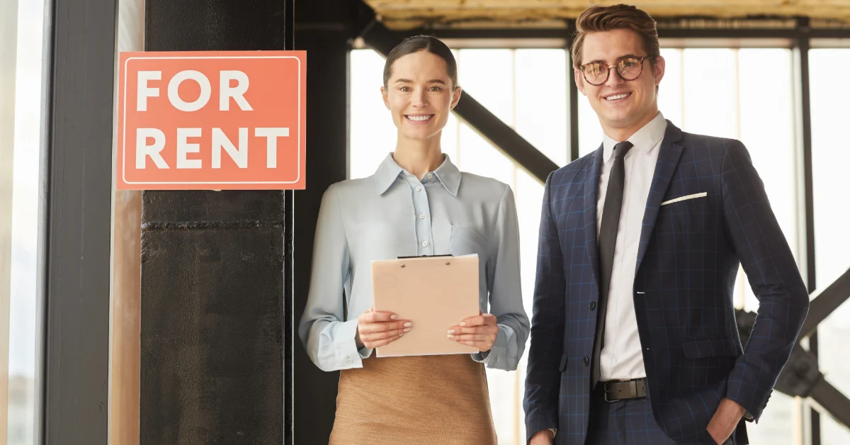 Realtors showing a cheap apartment to rent in Dubai