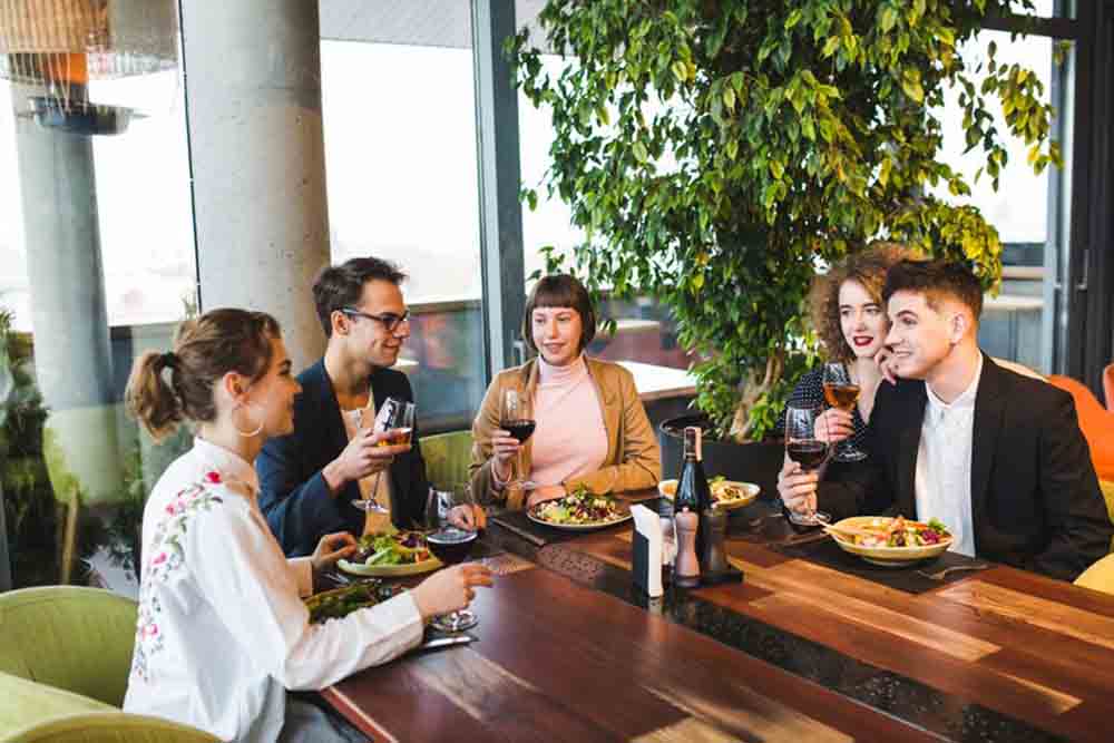 Friends Eating in a Restaurant