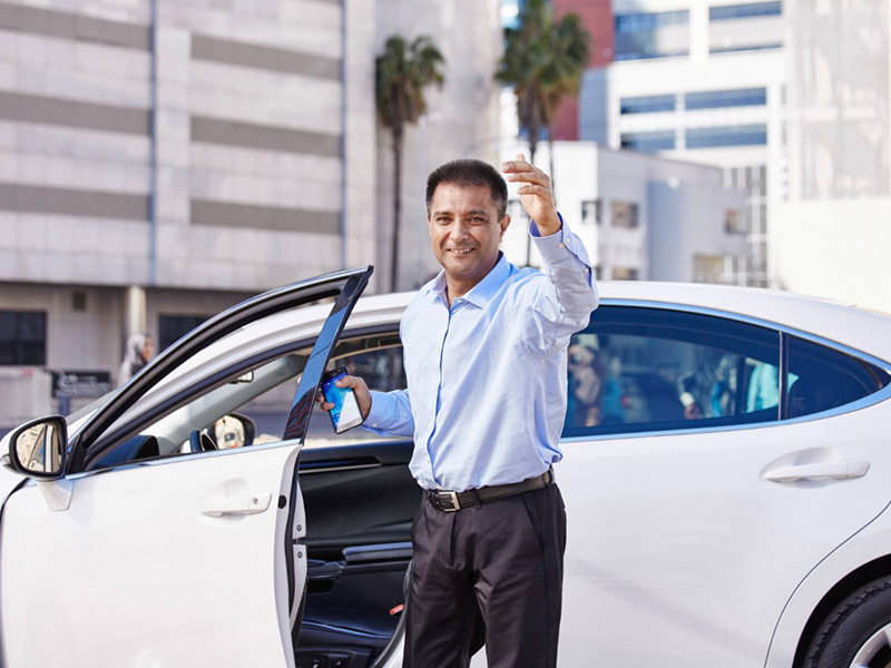 man with his car