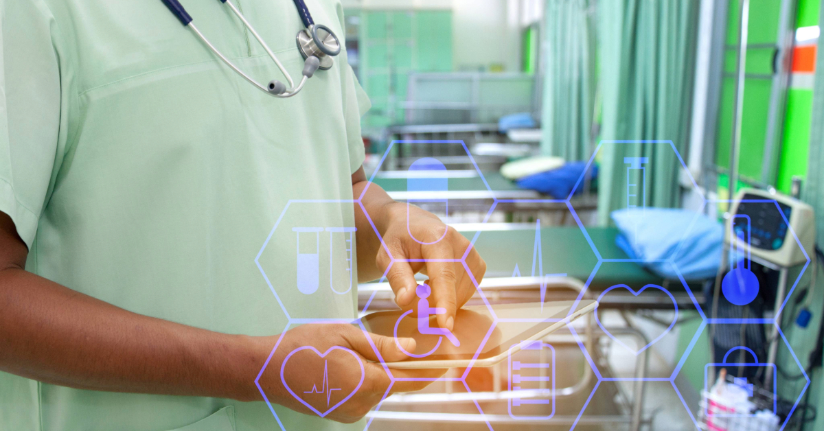 A healthcare professional stands in a light-filled clinic room