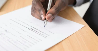 A person signing a contract document