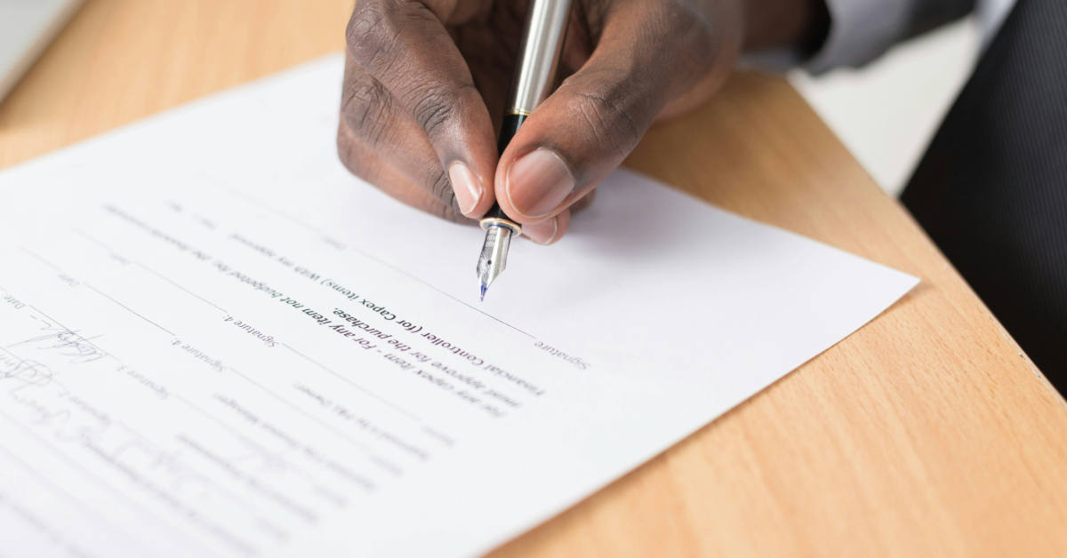 A person signing a contract document