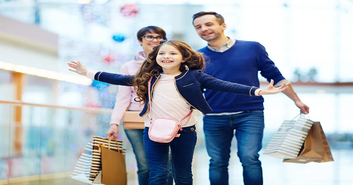 Family doing shopping in Al Ain malls