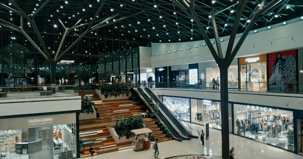 Escalator and sitting area inside the Al Hamra Mall