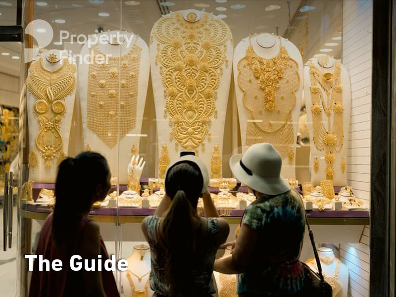 Gold items and jewelry for sale in a shop within the Gold Soukh