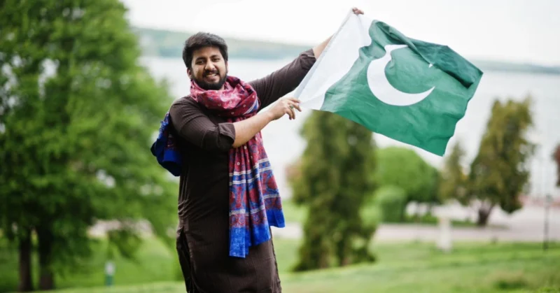 someone holding pakistani flag
