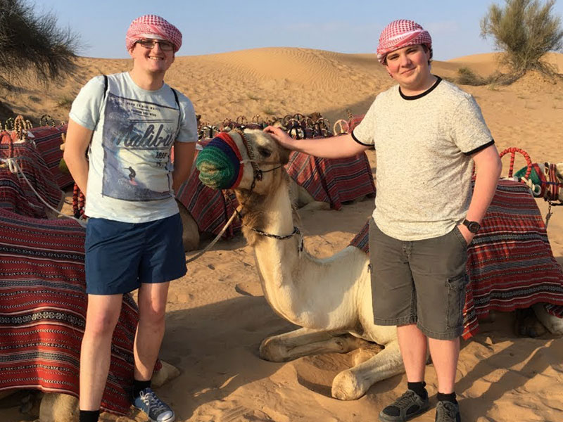 tourists in desert sharjah
