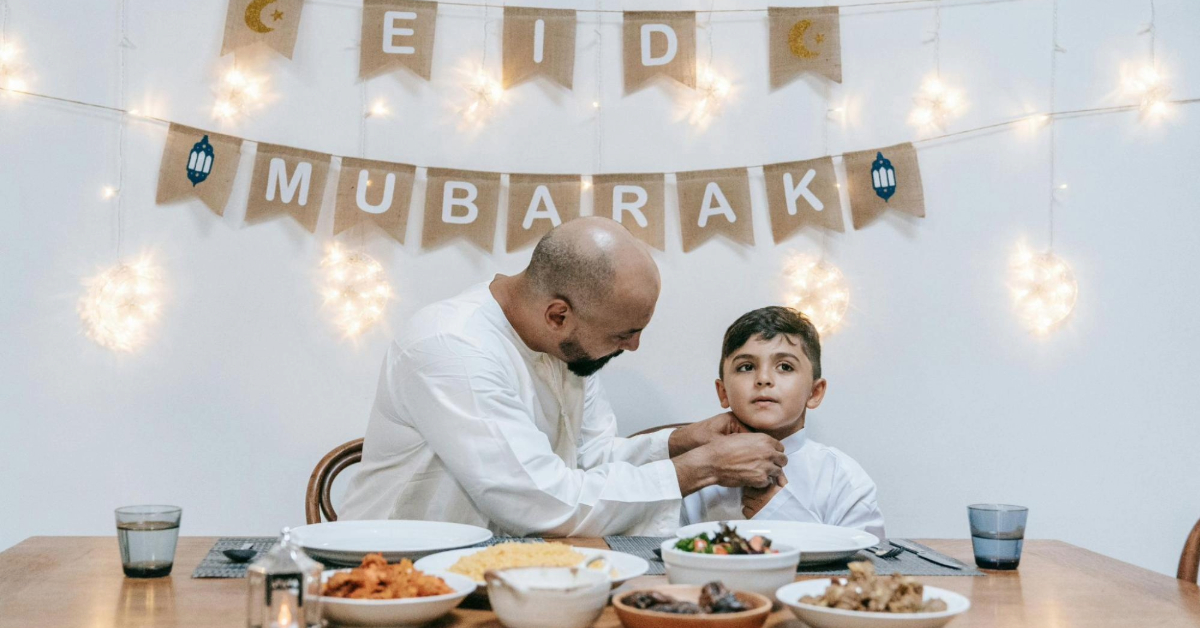 Family gathered on dining table celebrating Eid