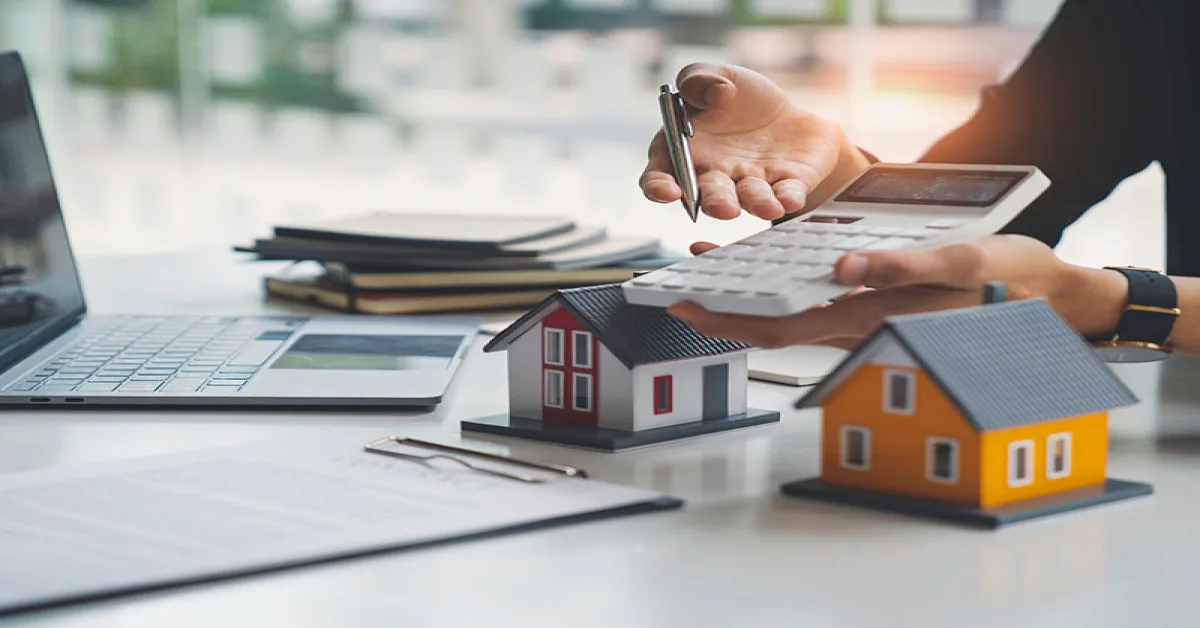 Someone is using a calculator to calculate ROI