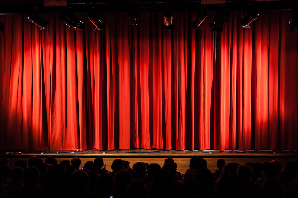 Audience Waiting for Theatre Performance 