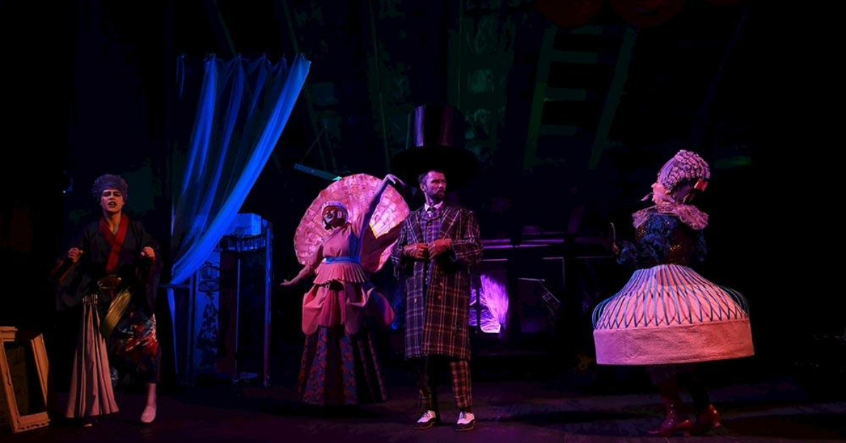 People performing a show in the theatre