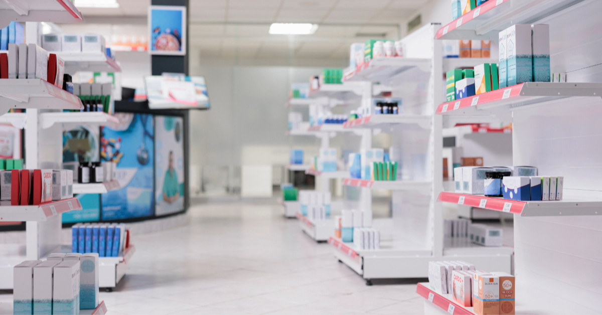 the interior of a bright pharmacy in a mall