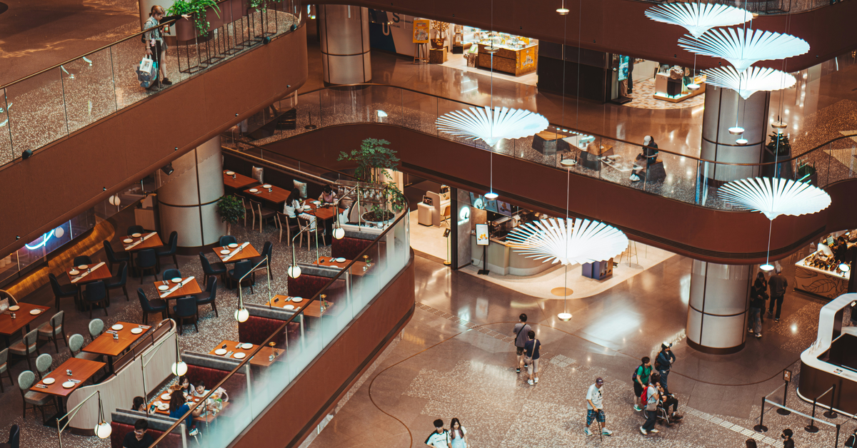 People walking and dining inside the mall