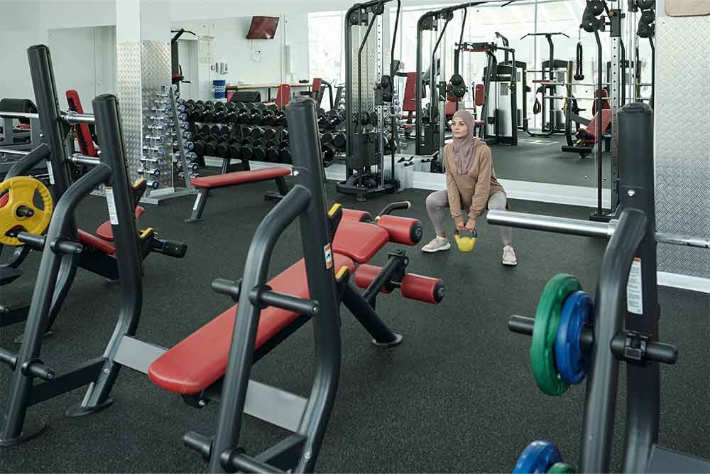 Exercising in Al Quoz gym