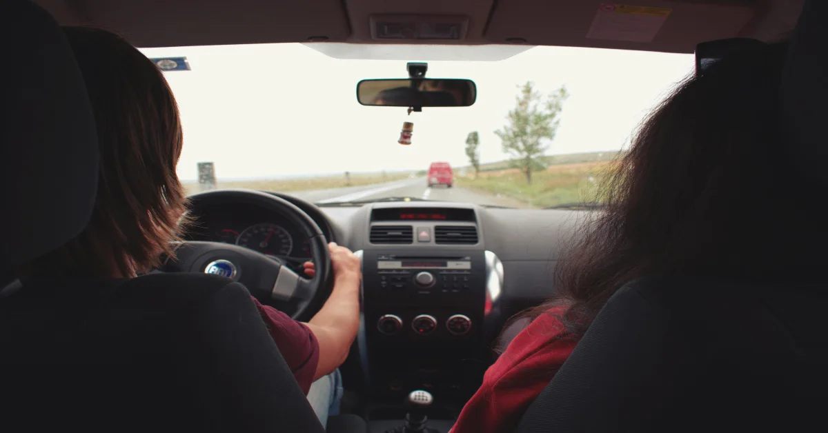 Two Woman Sitting Inside a car