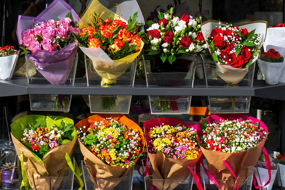 Flowers displayed on a Flower Shop window in Abu Dhabi 