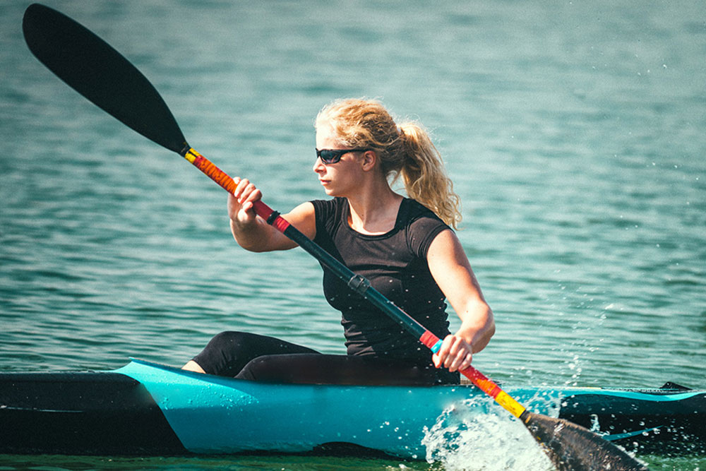 kayaker training on a lake