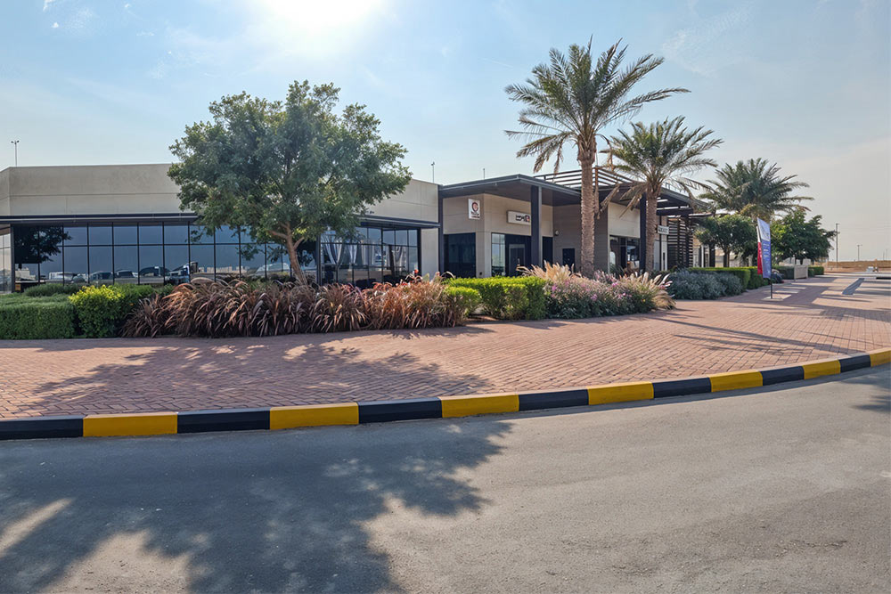 Tree-lined walkways in Tilal City