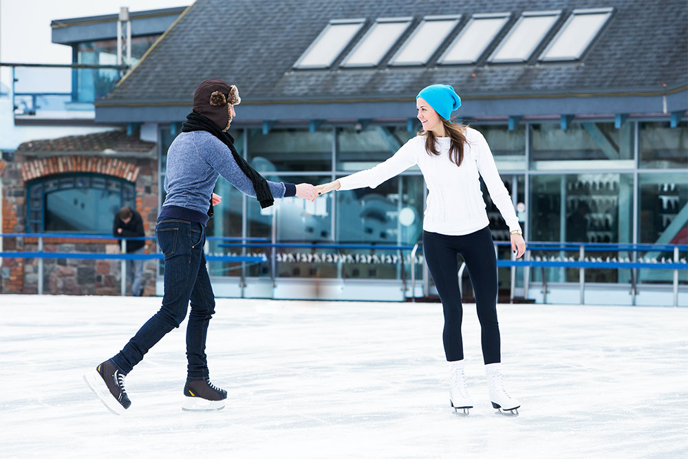 Two women on ice rink