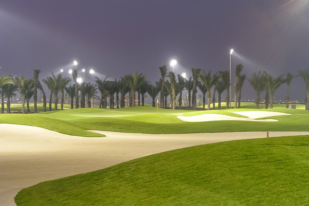 Floodlit golf course at Trump International Golf Club Dubai