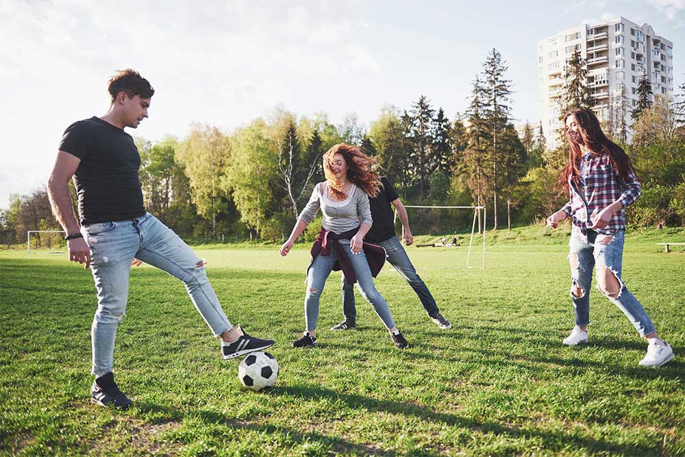 playing football at Al Bahya park