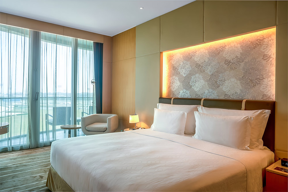 a neat and clean room in the meydan hotel