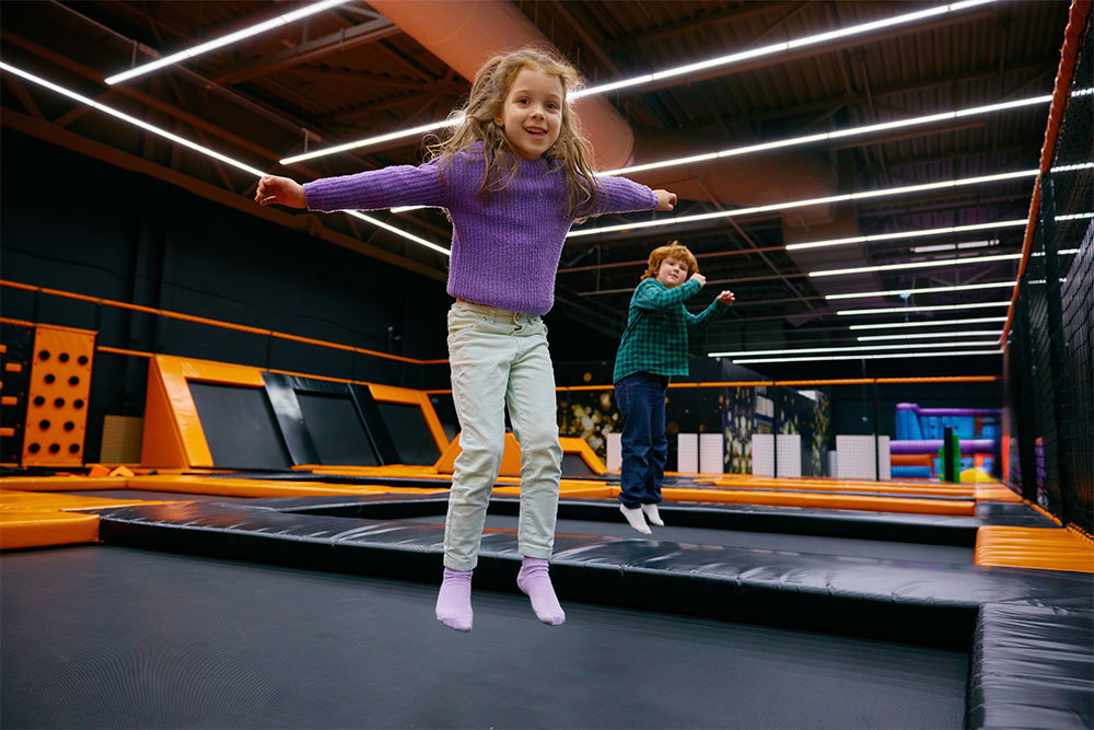 Kids jumping on the trampolines at Kidoos Entertainment 
