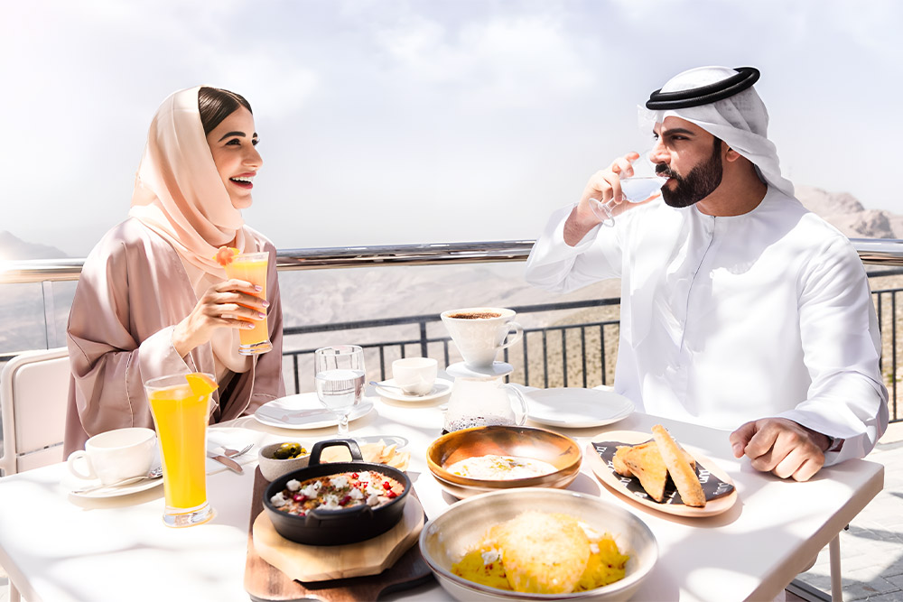 Couple dining at jebel jais adventure park restaurants