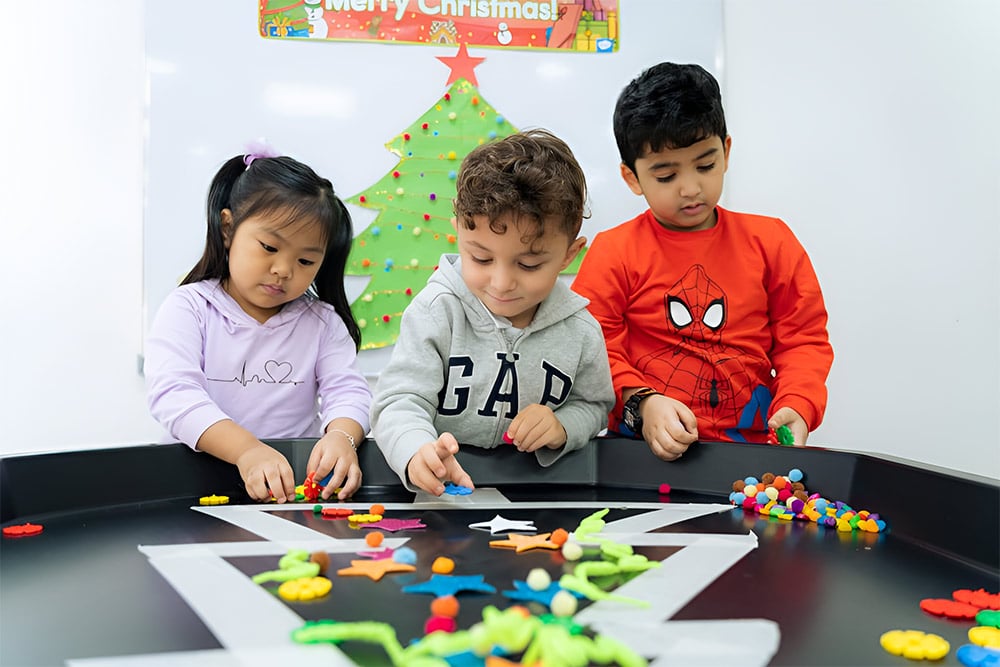Students engaged in play-to-learn activities