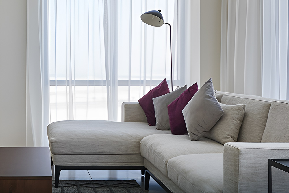 living room of Pacific apartments in Al Marjan RAK