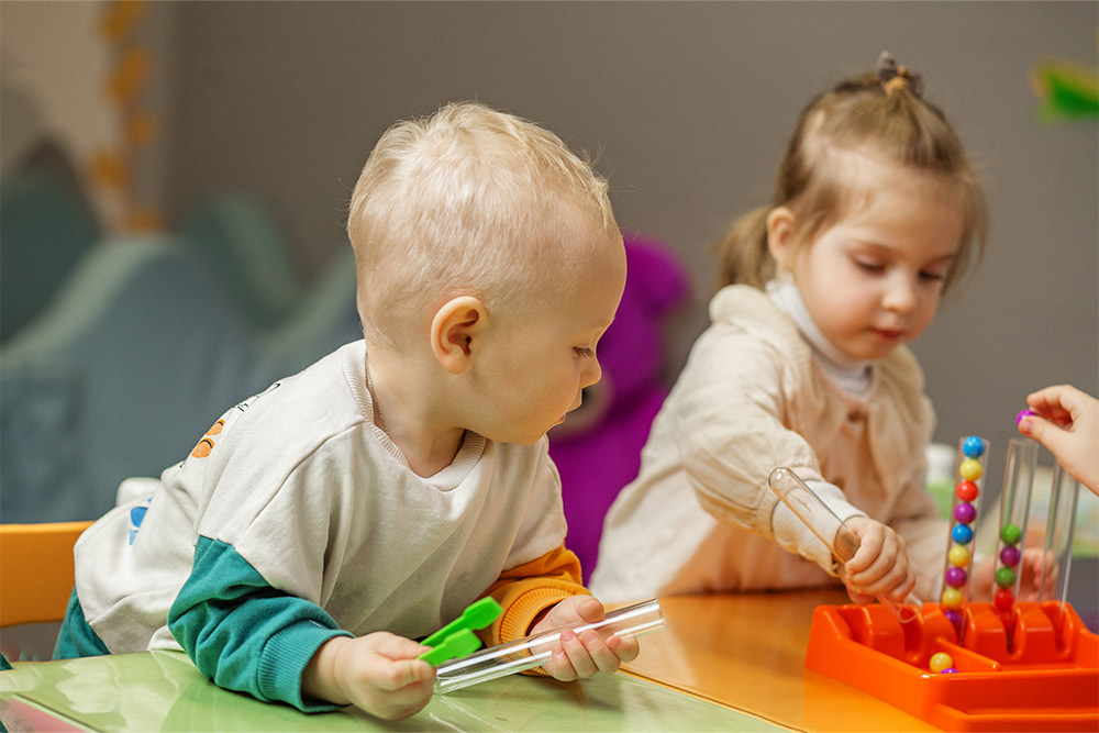Toddlers learning through games at an affordable nursery in Dubai 