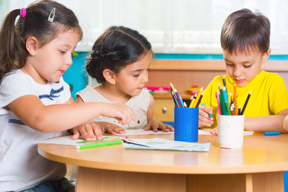 Preschool kids attending drawing class in one of the top schools in Abu Dhabi 