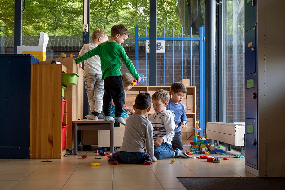 A group of students in an indoor play area