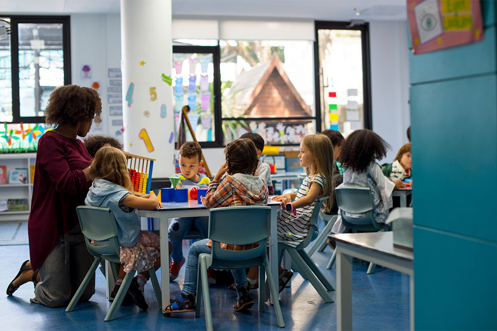 A dedicated instructor educating young minds in an affordable nursery in Dubai
