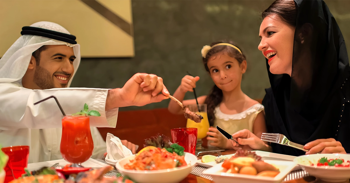 An Emirati family having dinner at Stills Restaurant in Yas Island