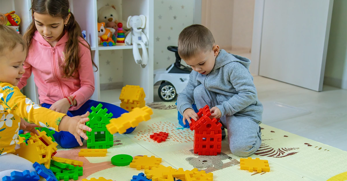  Students playing with toys in one of the best nurseries in JBR