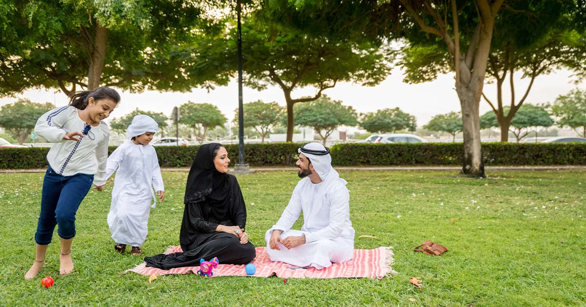 Family enjoying a picnic in Al Khabaisi Park