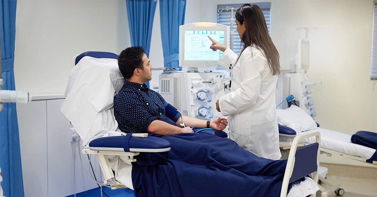 doctor and patient looking at a monogram