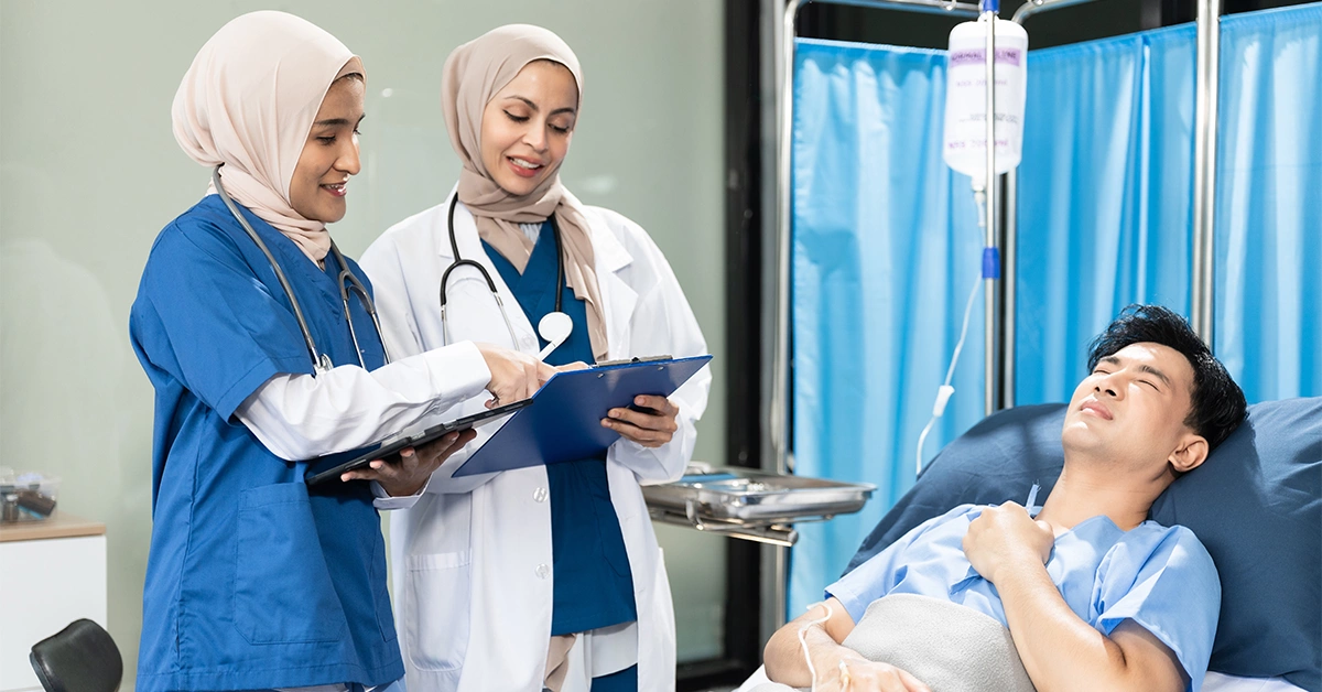 Nurses treating a patient in a hospital near Gardenia Townhomes