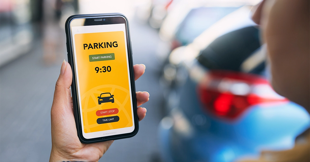 woman paying parking charges in Sharjah via UAE Parking app