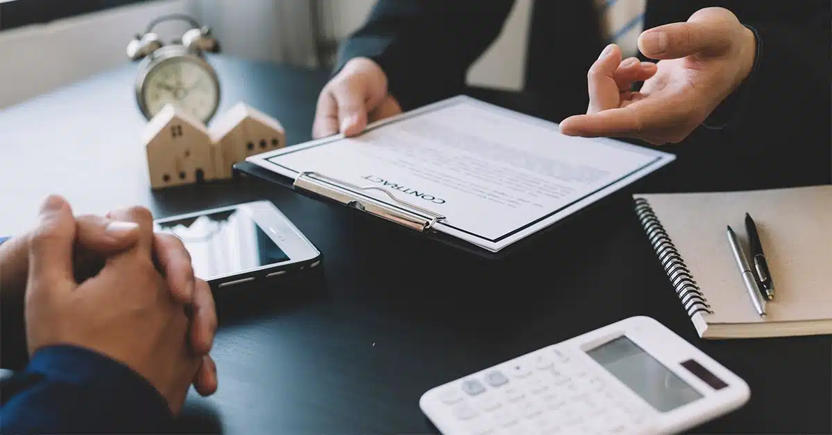A man reviewing a sales agreement
