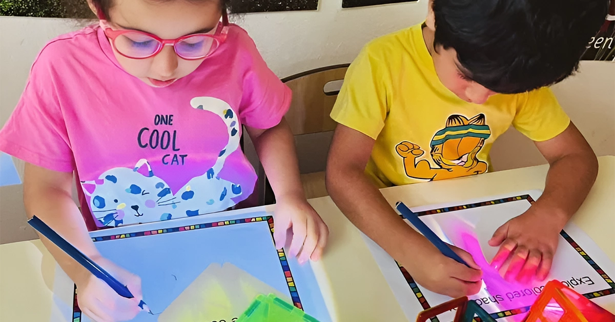 Children performing learning activities at Chubby Cheeks Nursery in JLT