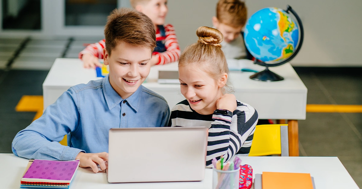 Children studying together in one of the best low fees schools in Ajman 