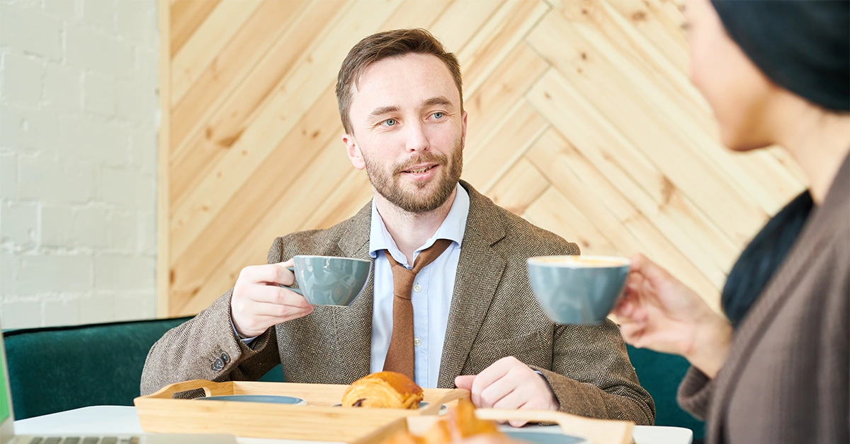 A group of friends having a business meeting in Aqaya Café and Restaurant 