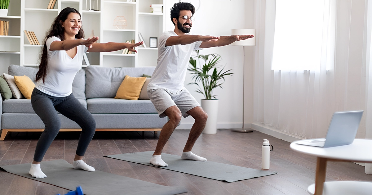 A couple doing home workout